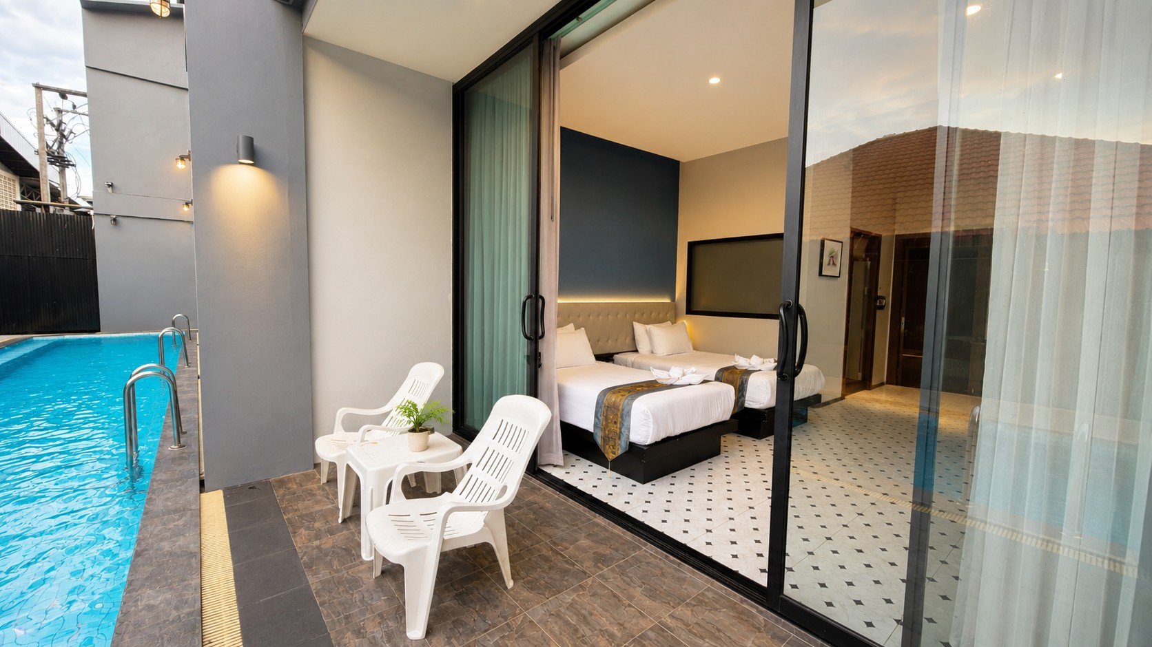 Deluxe Pool Access — poolside terrace
